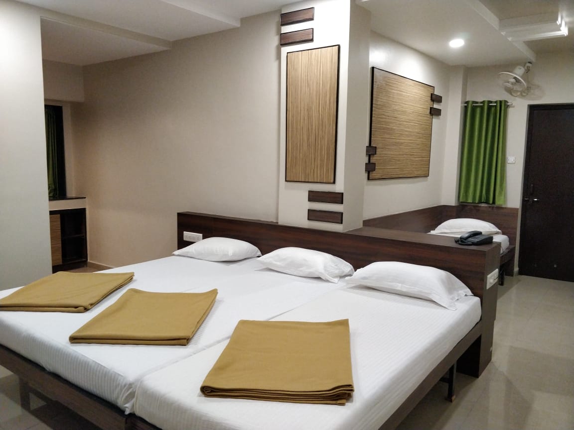 Hotel Raama Grand Lodging Kolhapur | 4 Bed AC